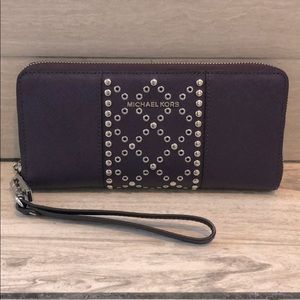 Michael Kors purple studded wristlet wallet